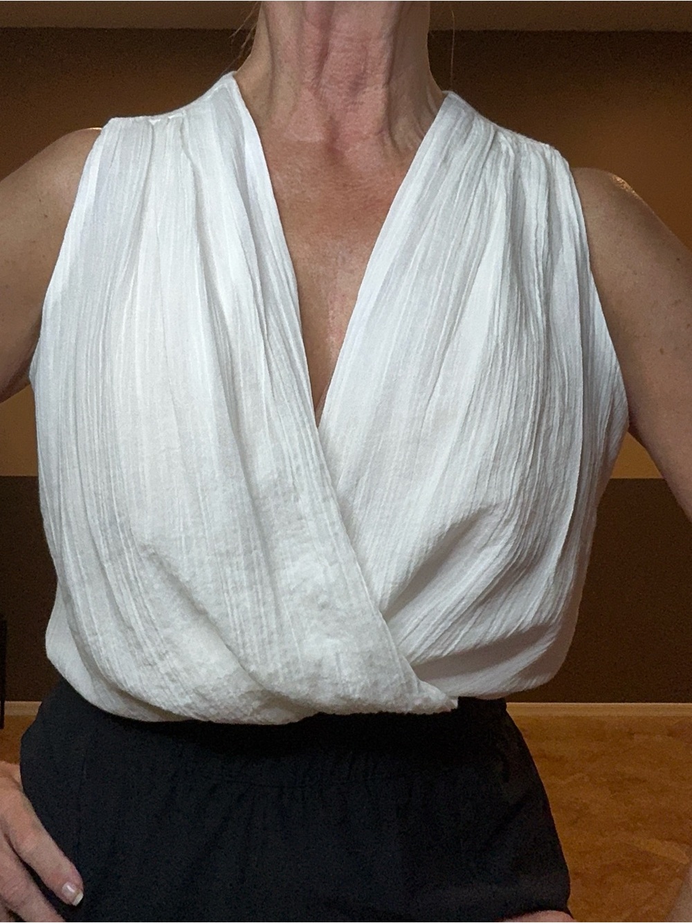 Express sleeveless, deep V neck, wrap front blouse bodysuit